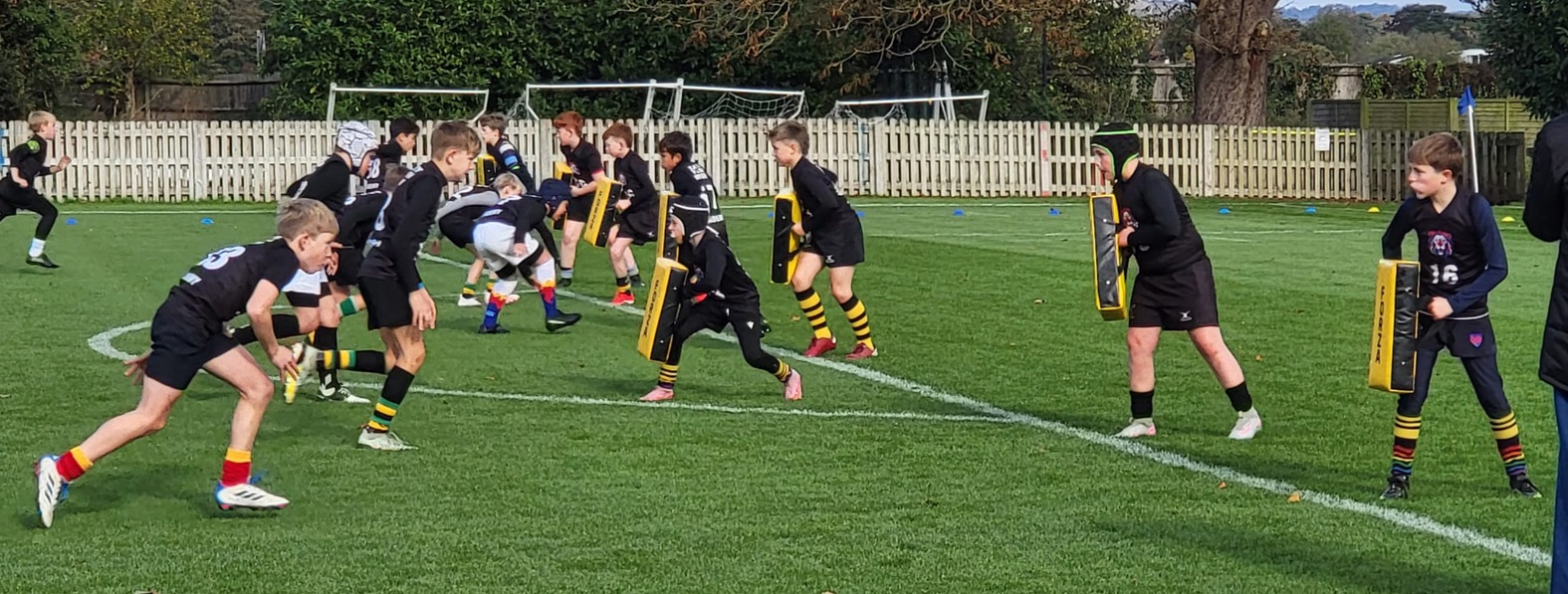 EYR Academy U11 players with rugby gear